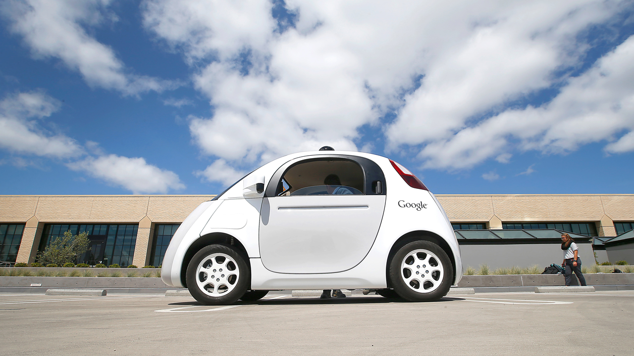 In this May 13, 2015, file photo, Google's new self-driving prototype car is presented during a demonstration at the Google campus in Mountain View, Calif.