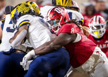 Indiana's CJ West tackles Michigan's Donovan Edwards at Memorial Stadium on Saturday, Nov. 9, 2024.