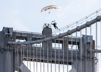 Skysurfer Boardslides San Francisco's Bay Bridge