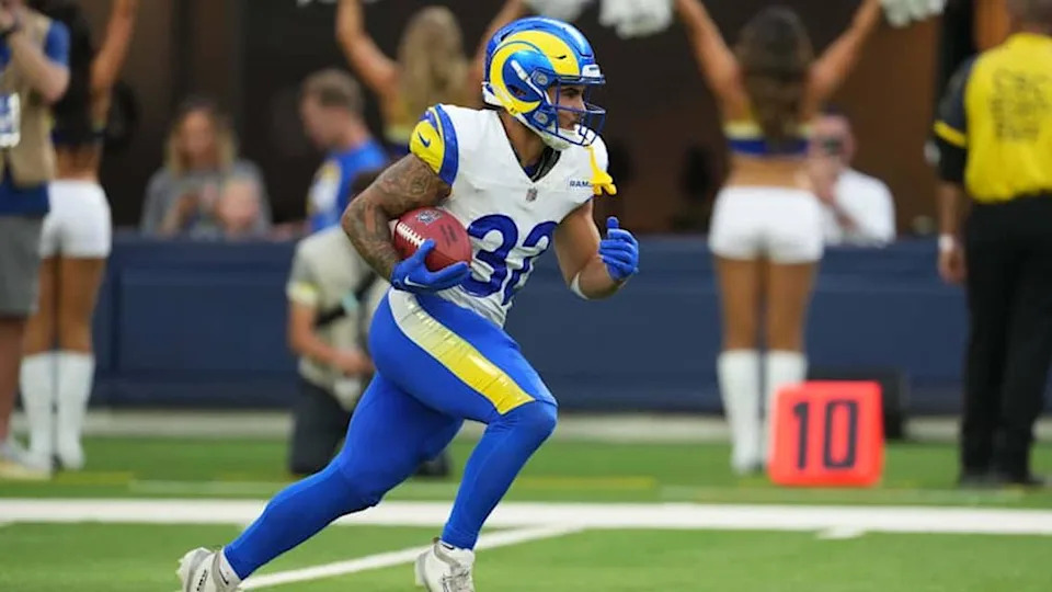 Los Angeles Rams cornerback Cam Lampkin (33) carries the ball against the Dallas Cowboys in the first half at SoFi Stadium in Inglewood, California, on Aug. 9, 2025.
