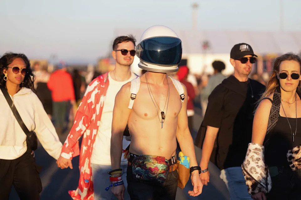 A festivalgoer wears an astronaut helmet during the Portola Music Festival on Pier 80 in San Francisco, Calif. on Sept. 21, 2025. (Douglas Zimmerman/SFGATE)