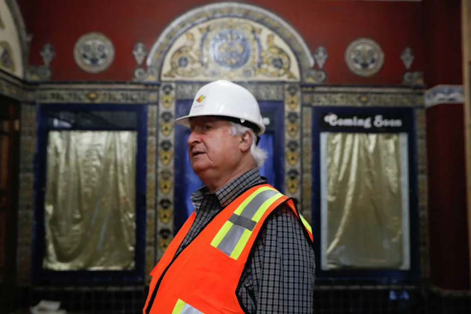 Gregg Perloff, President & CEO, Another Planet Entertainment, stands next to the old box office at the Castro Theater in San Francisco on May 7, 2025. (Lea Suzuki/S.F. Chronicle)