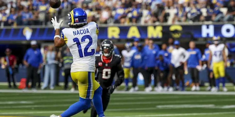 Los Angeles Rams wide receiver PukaNacua (12) catches a pass during the fourth quarter at SoFi Stadium in Inglewood on Sept. 7, 2025.