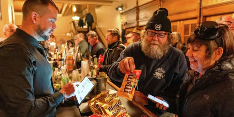 Bryce Bigwood and Gina Guidi grab concessions at the Castro Theatre before a pre-renovation send-off showing of