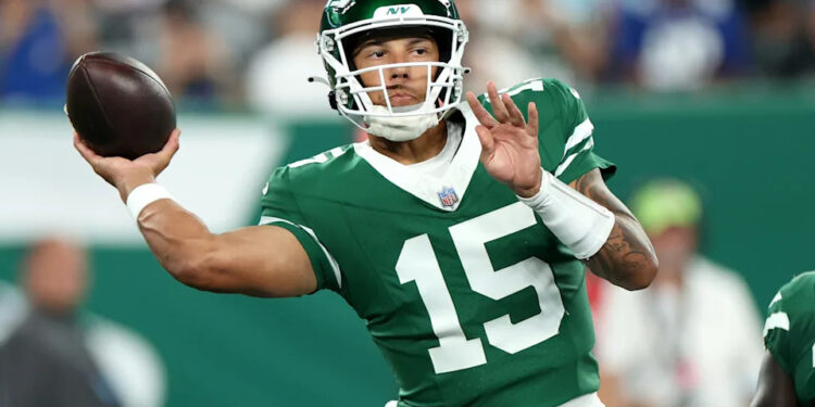 EAST RUTHERFORD, NEW JERSEY - AUGUST 24: Adrian Martinez #15 of the New York Jets throws a pass against the New York Giants during the first quarter of a preseason game at MetLife Stadium on August 24, 2024 in East Rutherford, New Jersey. (Photo by Luke Hales/Getty Images)Luke Hales&sol;Getty Images