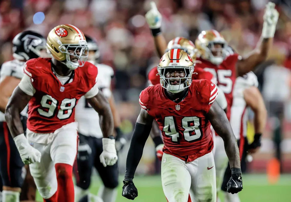 Tatum Bethune (48) celebrates his sack of Michael Penix Jr. (9) in the second half as the San Francisco 49ers played the Atlanta Falcons at Levi's Stadium in Santa Clara, Calif., on Sunday, Oct. 19, 2025. (Carlos Avila Gonzalez/S.F. Chronicle)