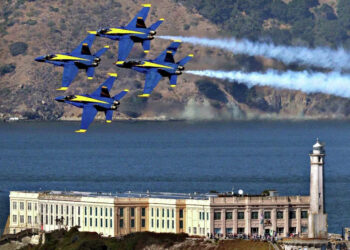 The Blue Angels practice their aerial maneuvers near Alcatraz Island over San Francisco Bay as seen from the Fairmont Hotel in San Francisco on Oct. 10, 2019. (Carlos Avila Gonzalez/S.F. Chronicle)
