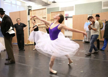Tiler Peck, center, with cast in rehearsal for the Kennedy Center Production of