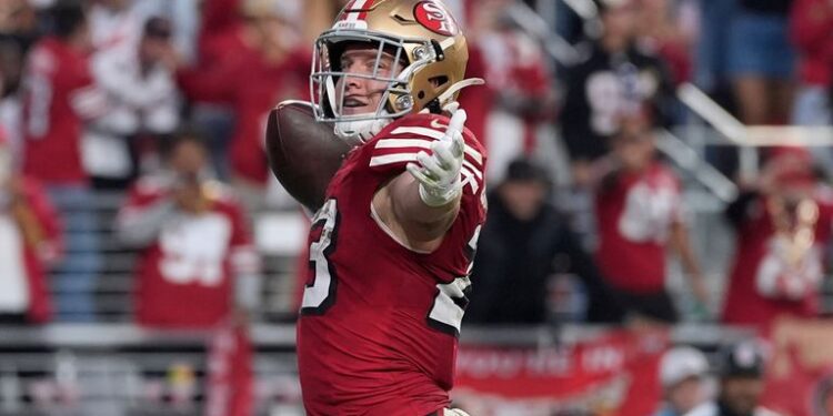San Francisco 49ers running back Christian McCaffrey (23) celebrates his touchdown against the Atlanta Falcons in the first half of an NFL football game, Sunday, Oct. 19, 2025, in Santa Clara, Calif. (AP Photo/Godofredo A. V..squez)