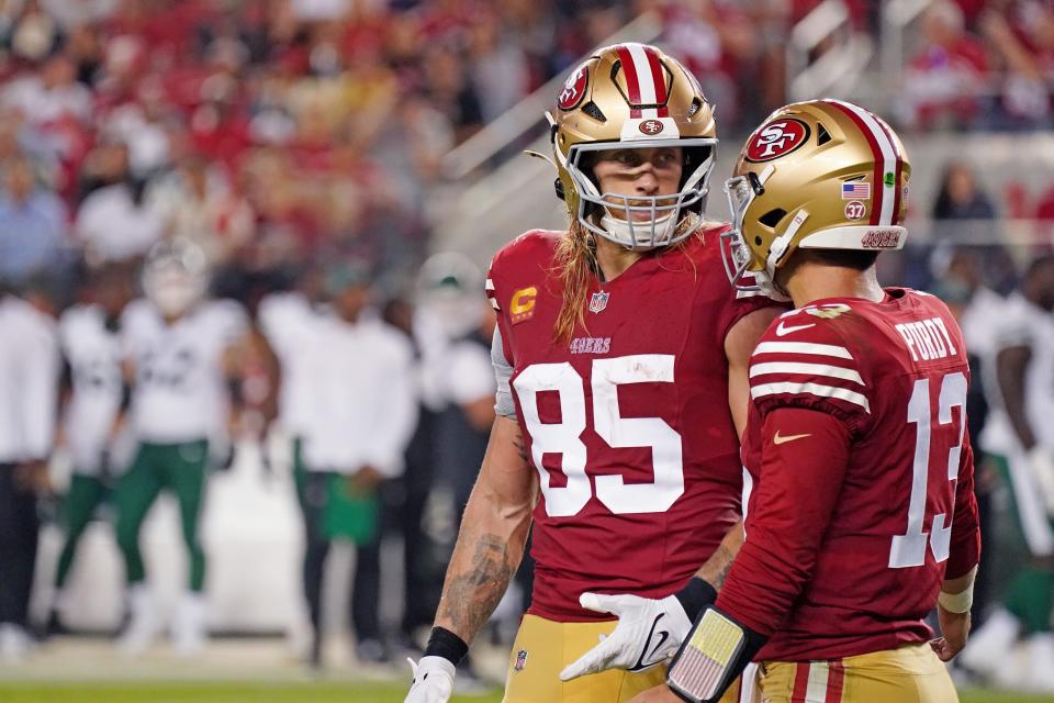 Sep 9, 2024; Santa Clara, California, USA; San Francisco 49ers tight end George Kittle (85) chats with San Francisco 49ers quarterback Brock Purdy (13) while facing the New York Jets in the fourth quarter at Levi's Stadium. Mandatory Credit: David Gonzales-Imagn Images