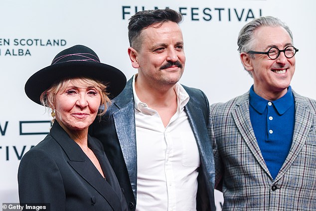 Jono is a moviemaker, who has been recognised by BAFTA Scotland for his work (pictured with Lulu and Alan Cummings in 2022 at the My Old School premiere)